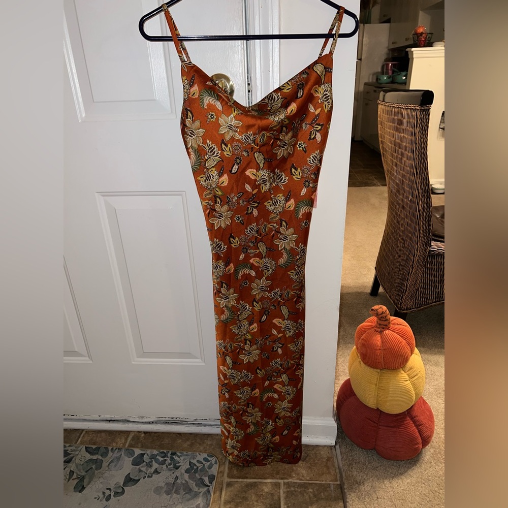 Woman’s small brown flower dress